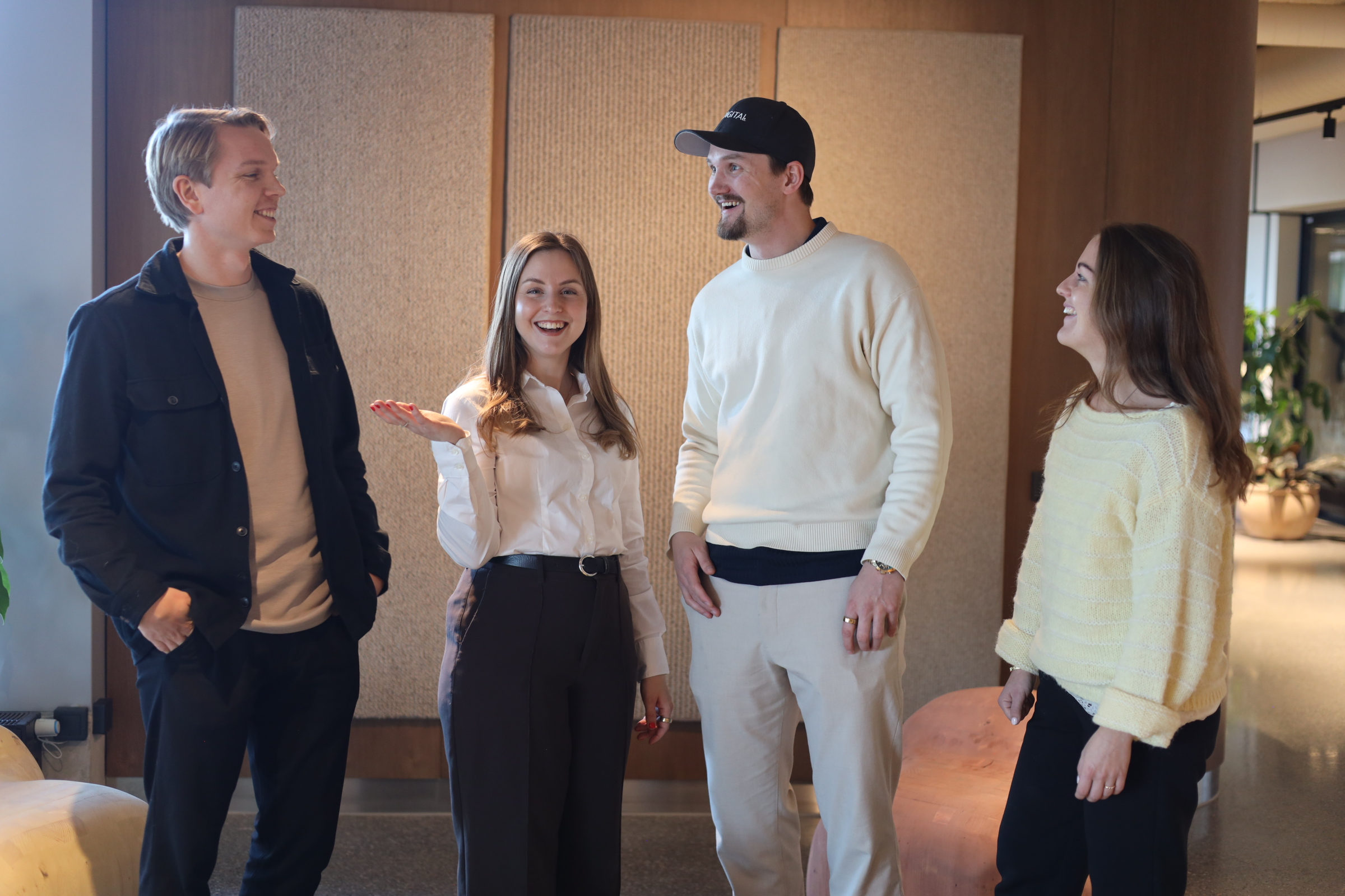 Ondigital team standing together in the office